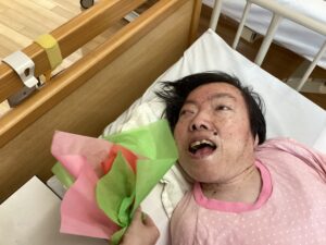 利用者さん１とブーケの写真
